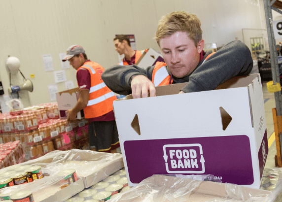 Workers processing donations