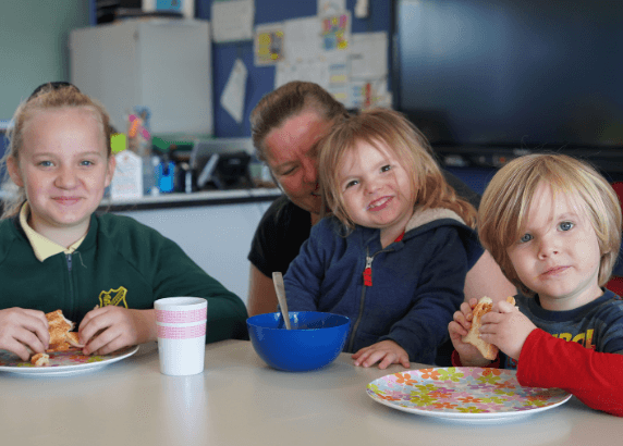 Children and a mother eating food