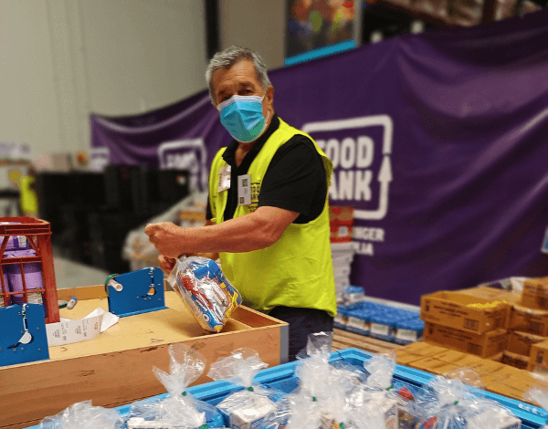 foodbank volunteer viktor packing hampers