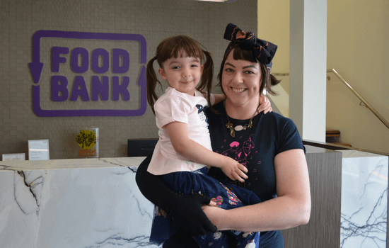 Mother and daughter at Foodbank