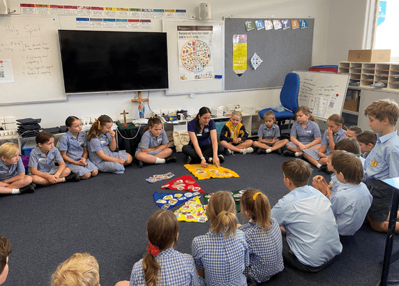 children attentively learning about nutrition