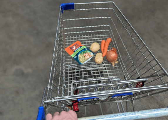Customer Story showing potatoes and carrots in a grocery cart