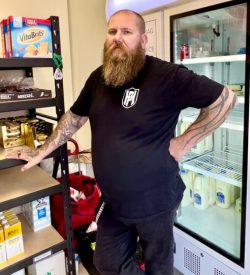 Park Towers resident Troy in community pantry